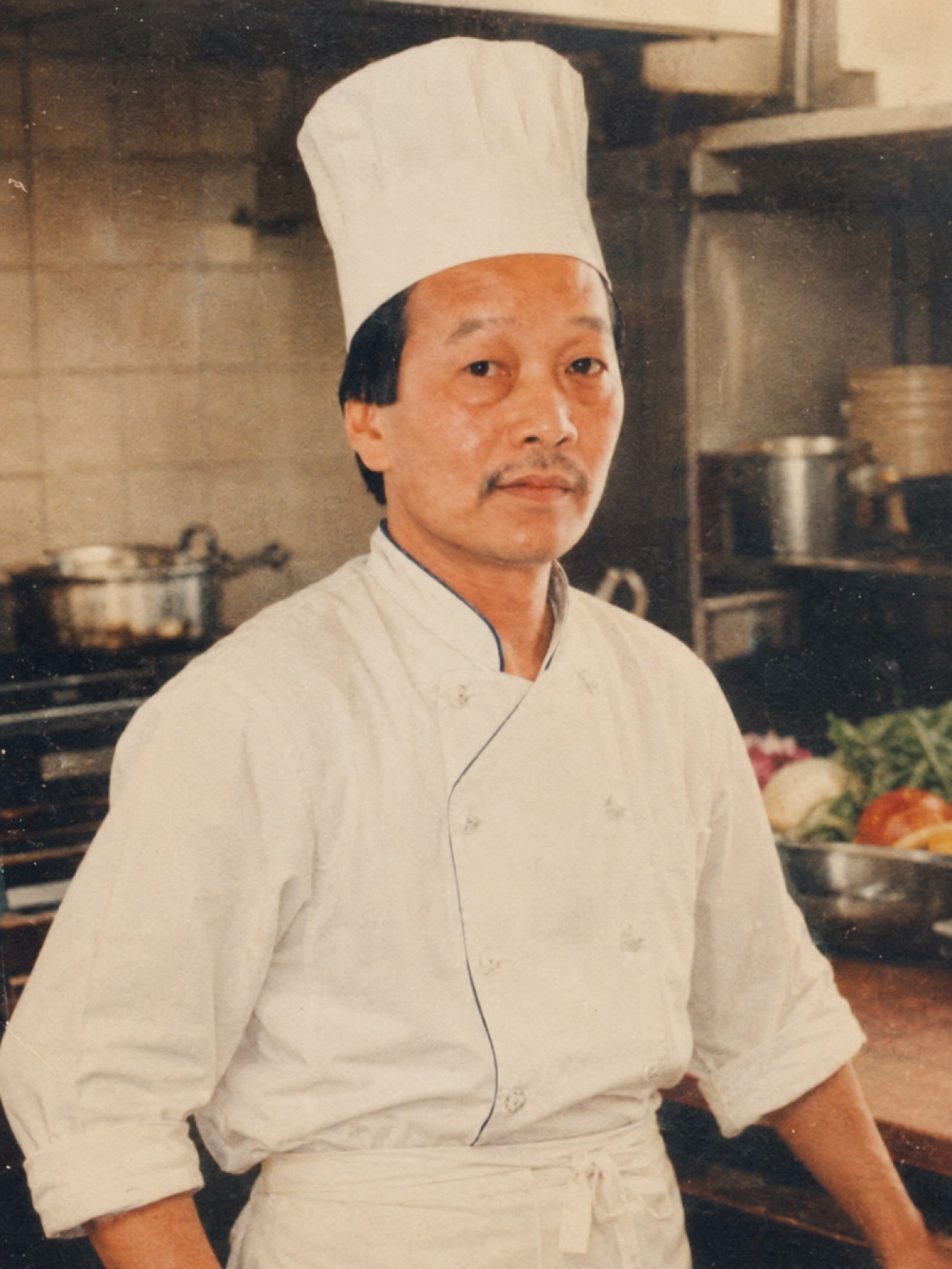 An Van Vu in the kitchen of the original Saigon Seasons